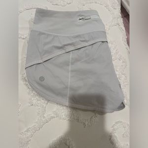 white lululemon shorts